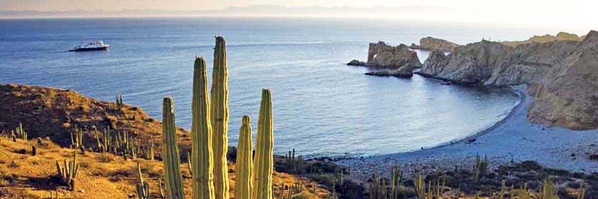 A small ship in a Baja California cove.