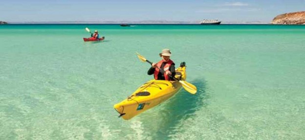 Cruise guest in sea kayak in the Sea of Cortez